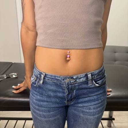 Belly navel piercing