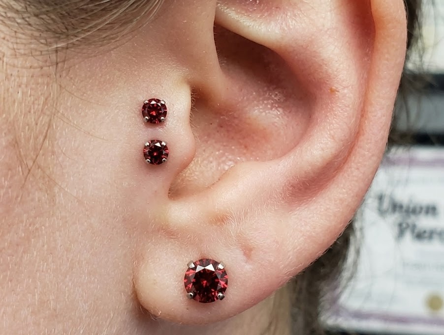 Forward helix piercings